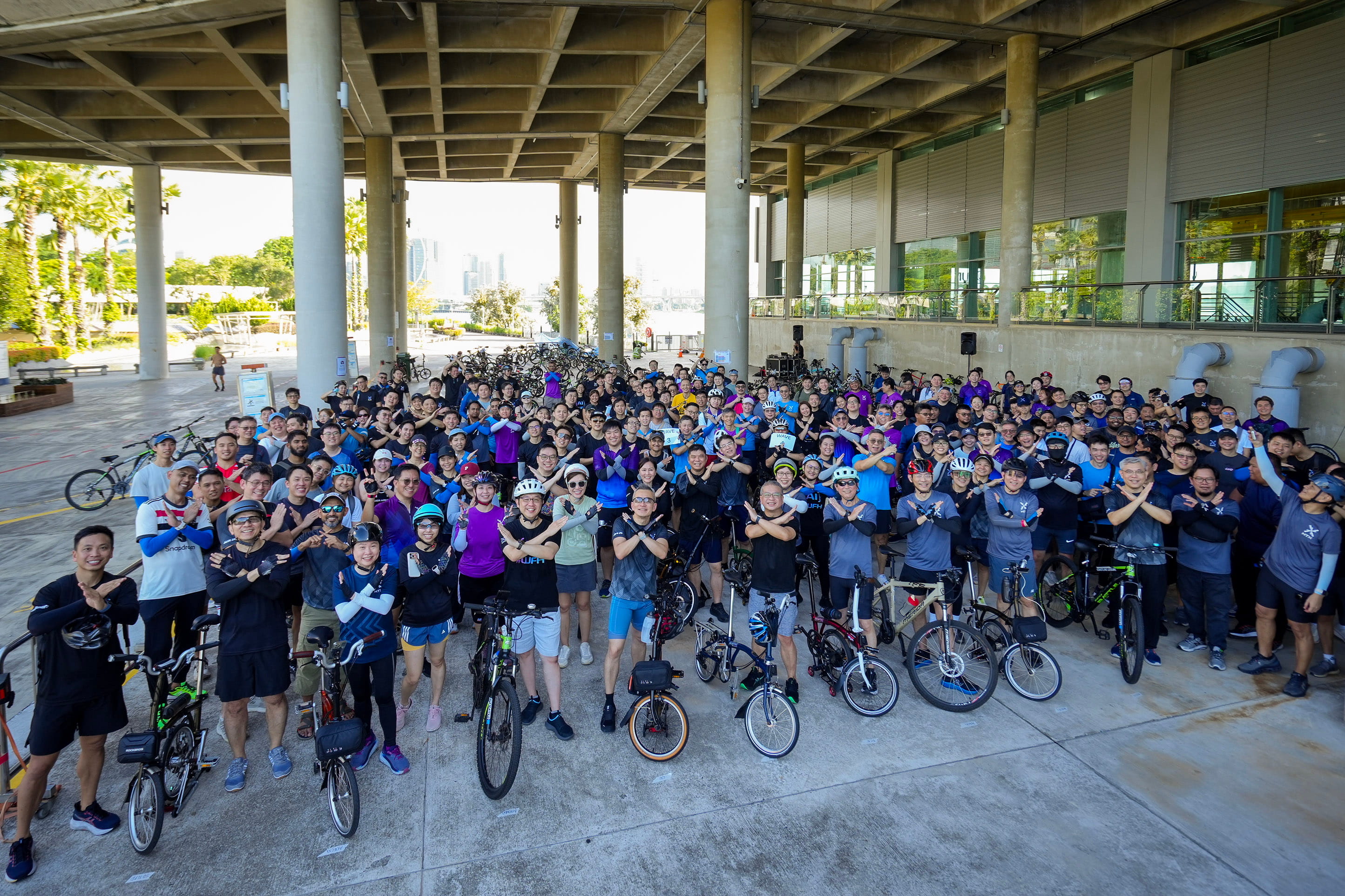 Group of people with bikes.